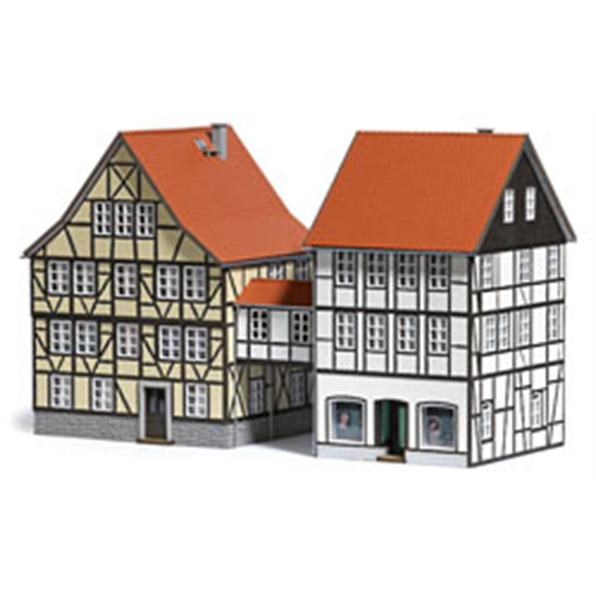 2 Half-timbered Houses connected with Brid