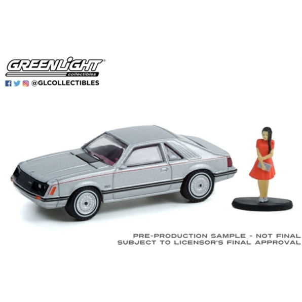 Ford Mustang Coupe Ghia with Woman in a Dress 1979